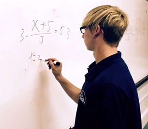 Ocean Tides student at the white board